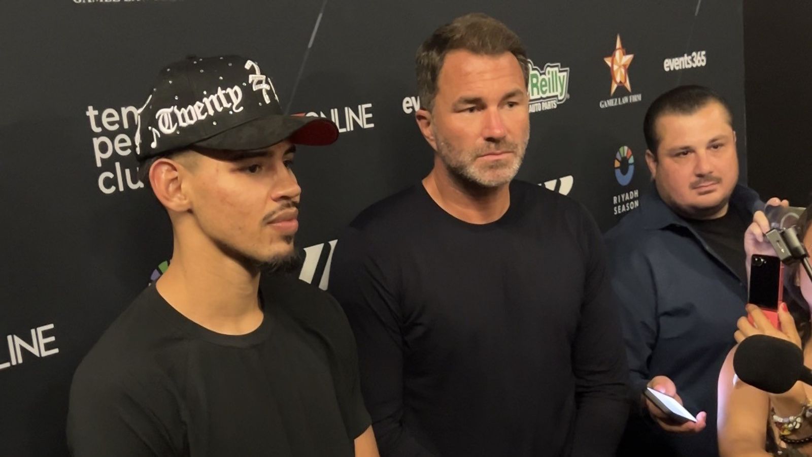 Diego Pacheco with Eddie Hearn at the post-fight press conference