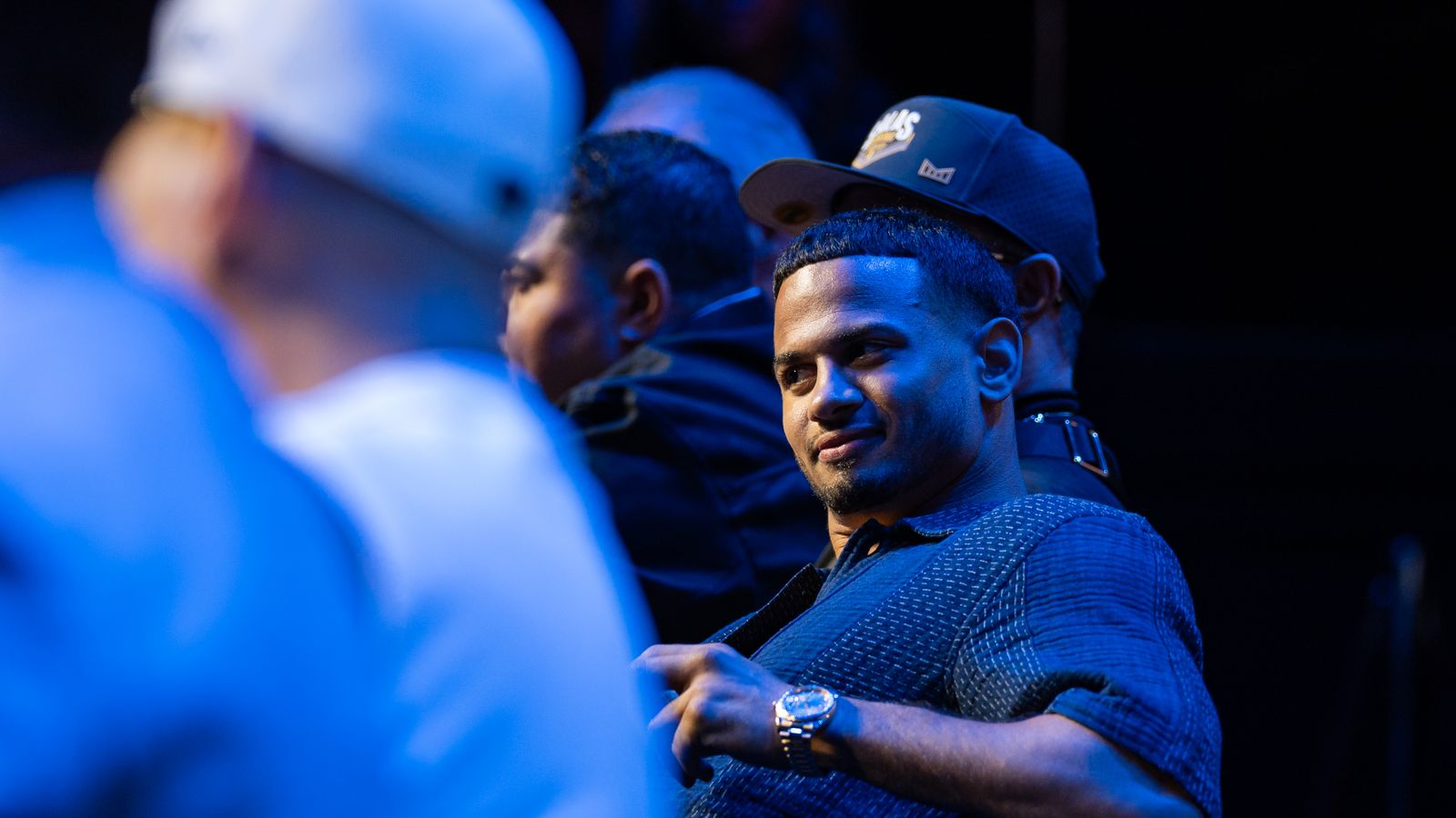 Rolly Romero smirks at the Lopez duo during the press event