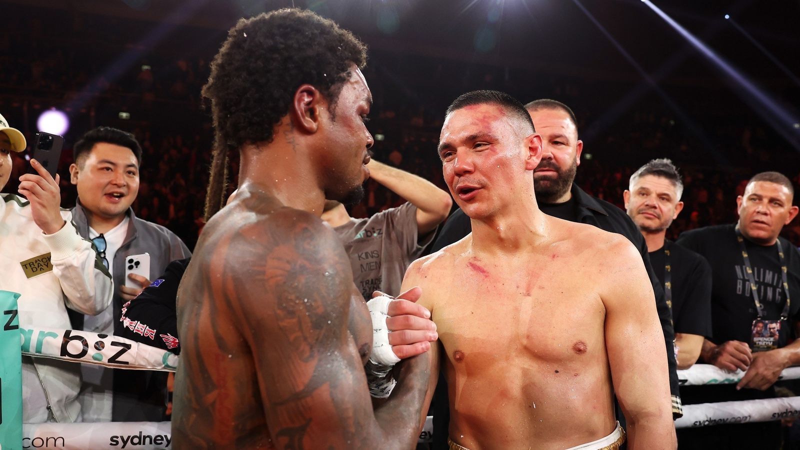 Tim Tszyu and Errol Spence Jr. embrace after the final bell.