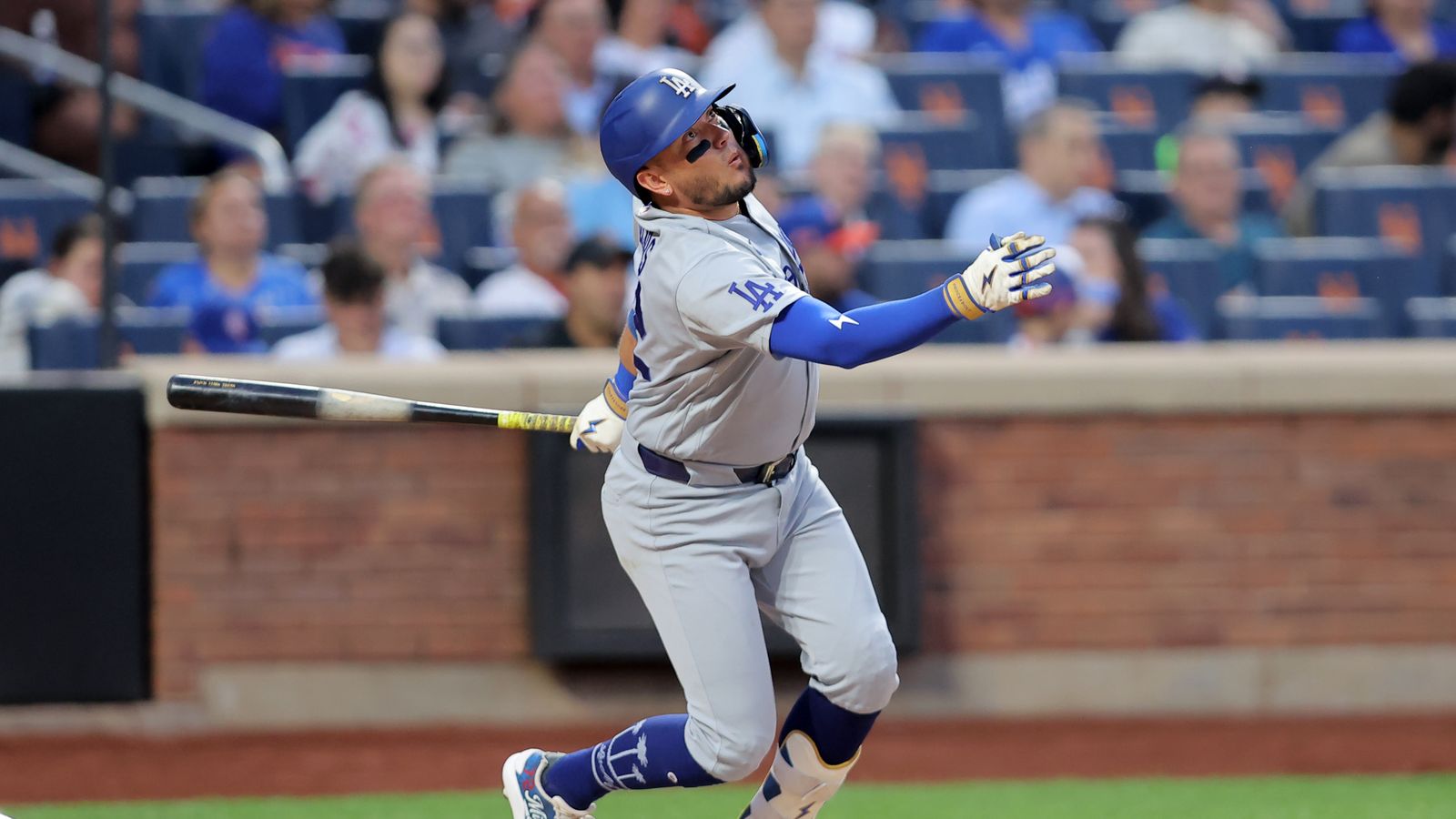 Miguel Rojas executes an RBI sacrifice fly in the fourth inning at Citi Field.