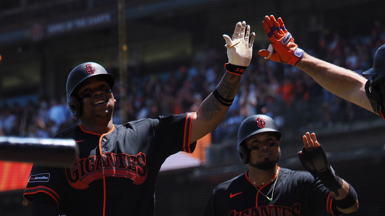 Rafael Devers celebrates a three-run homer at Oracle Park