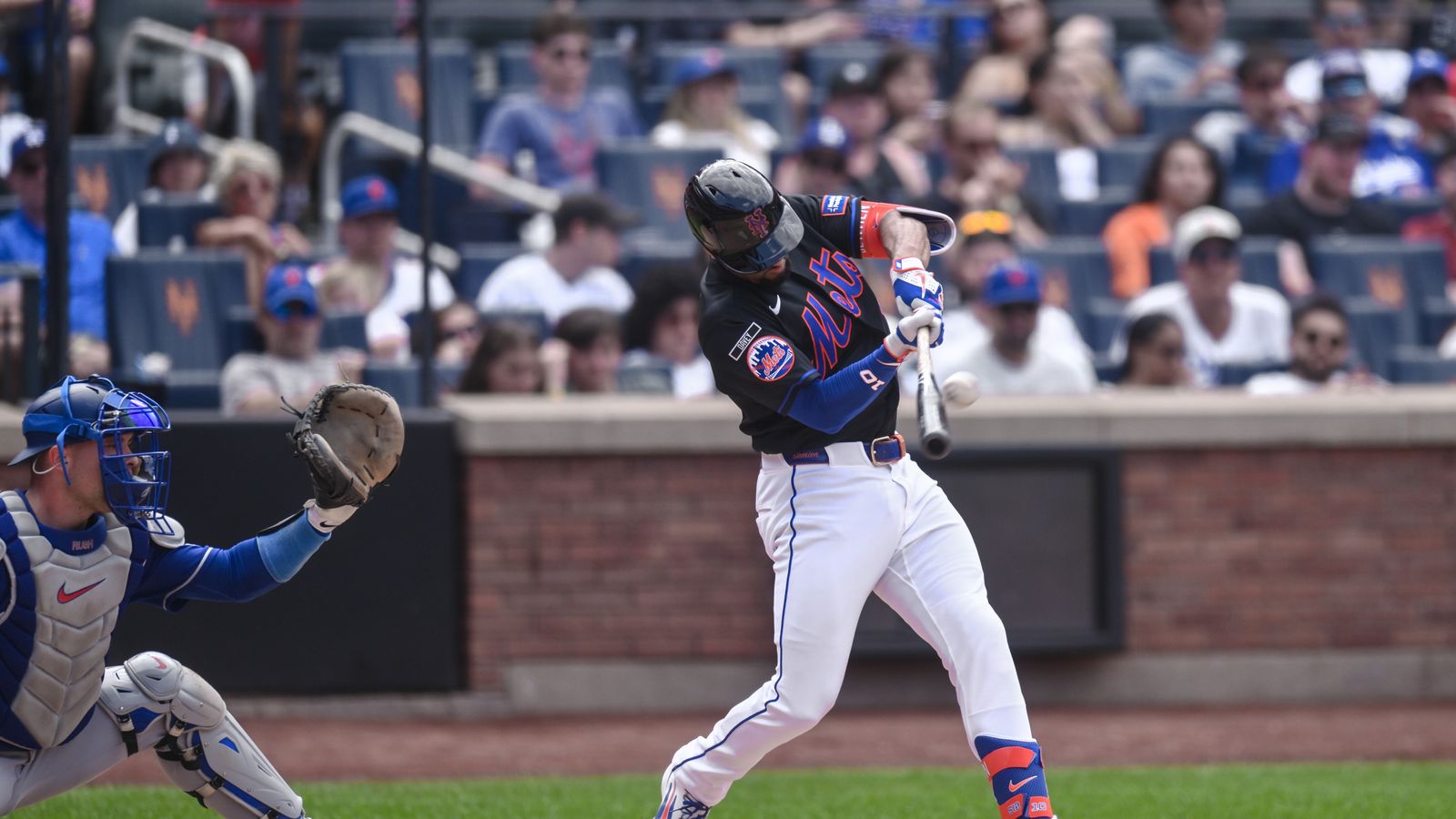 Marcus Semien of the Mets hits a three-run homer against the Dodgers.