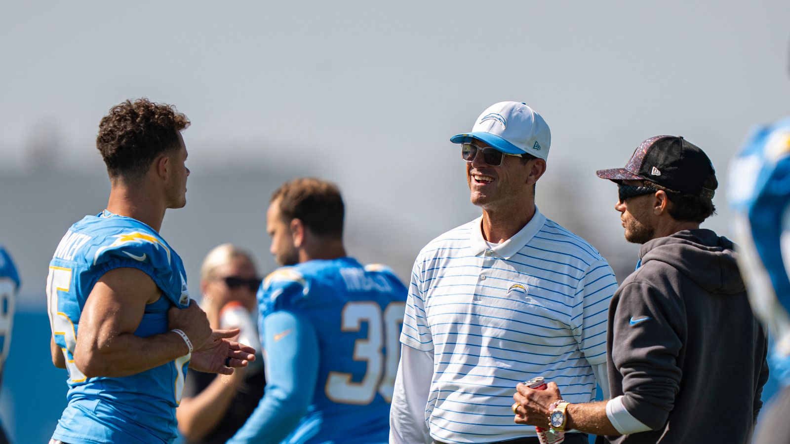 Ladd McConkey with Coaches Harbaugh and McDaniels at Camp