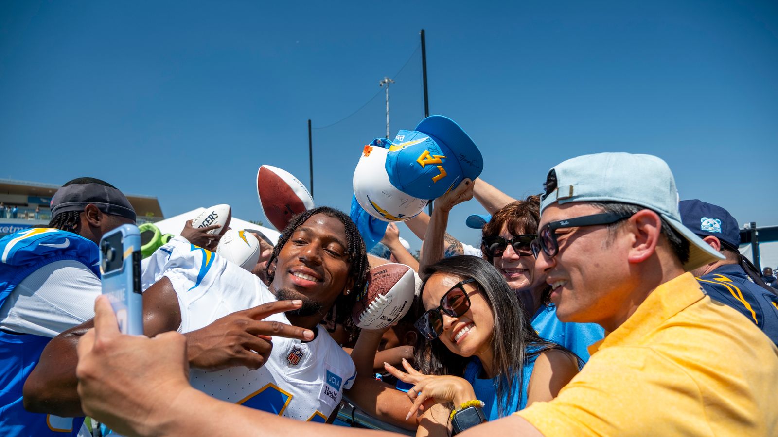 Myles Purchase Takes Photos with Fans at Chargers Camp