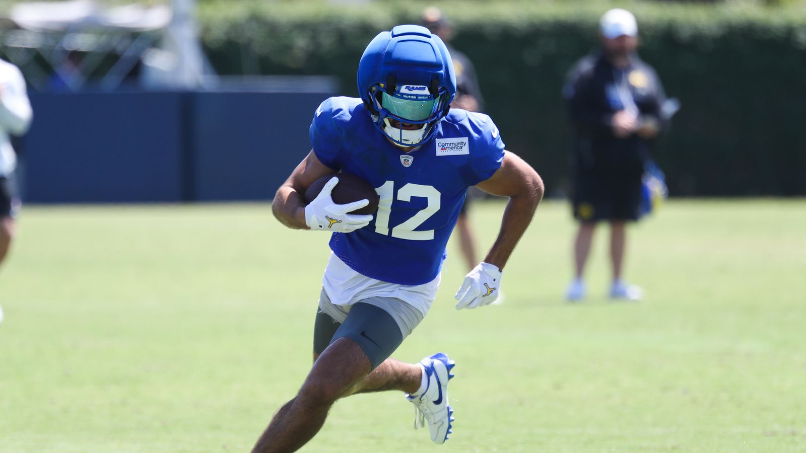 Puka Nacua runs with the football at Rams Training Camp, August 3, 2026
