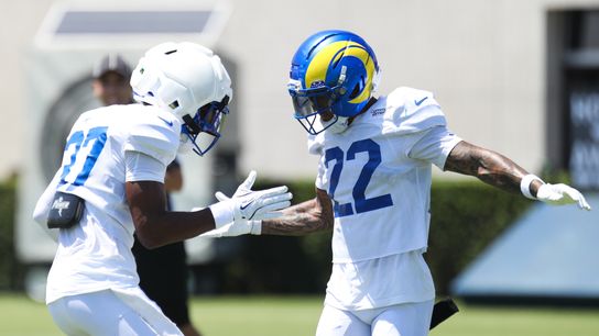 Trent McDuffie celebrates a stop at Rams training camp