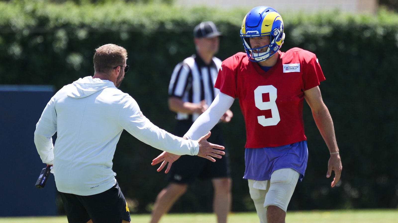 Matthew Stafford and Sean McVay embrace at Rams Training Camp, August 3, 2026