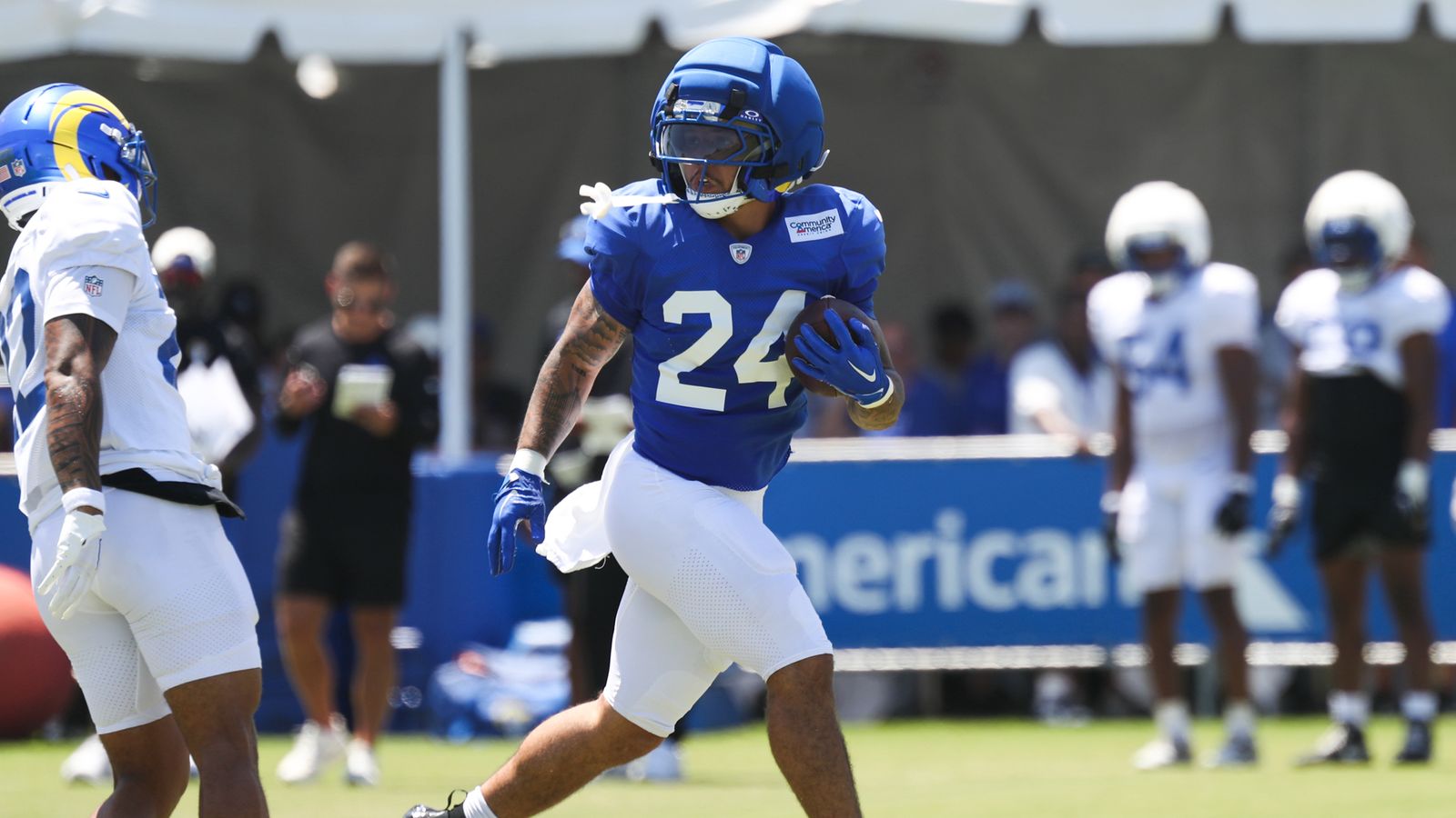 Blake Corum runs the football at Rams Training Camp, August 3, 2026