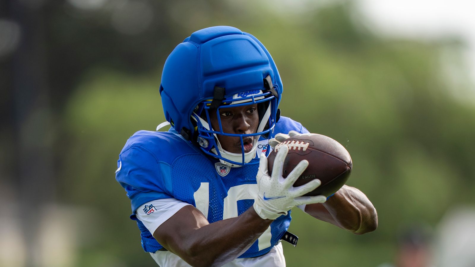 Tru Edwards #16 practices at Rams training camp.