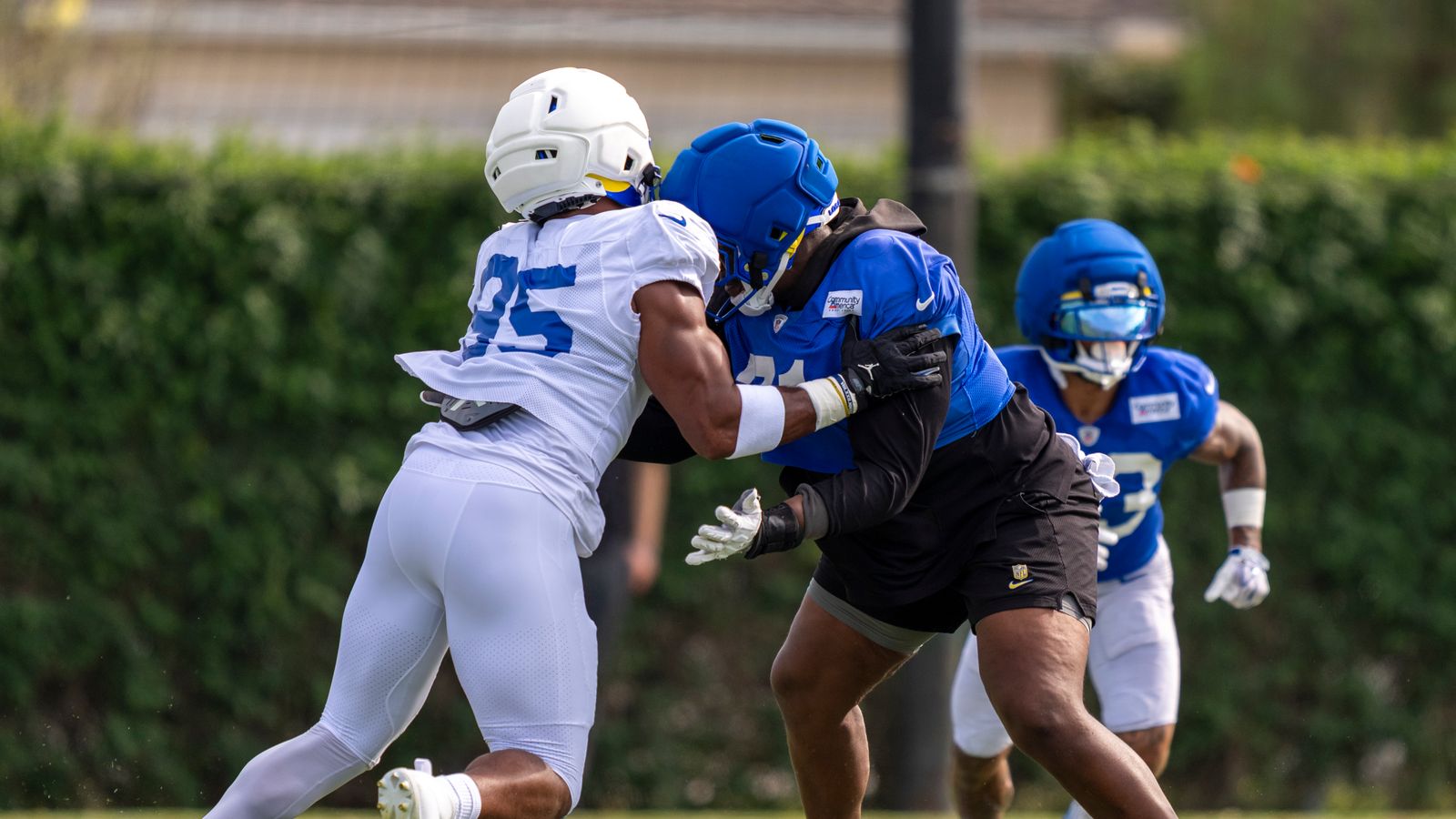 Myles Garrett #95 practices defense at Rams training camp.