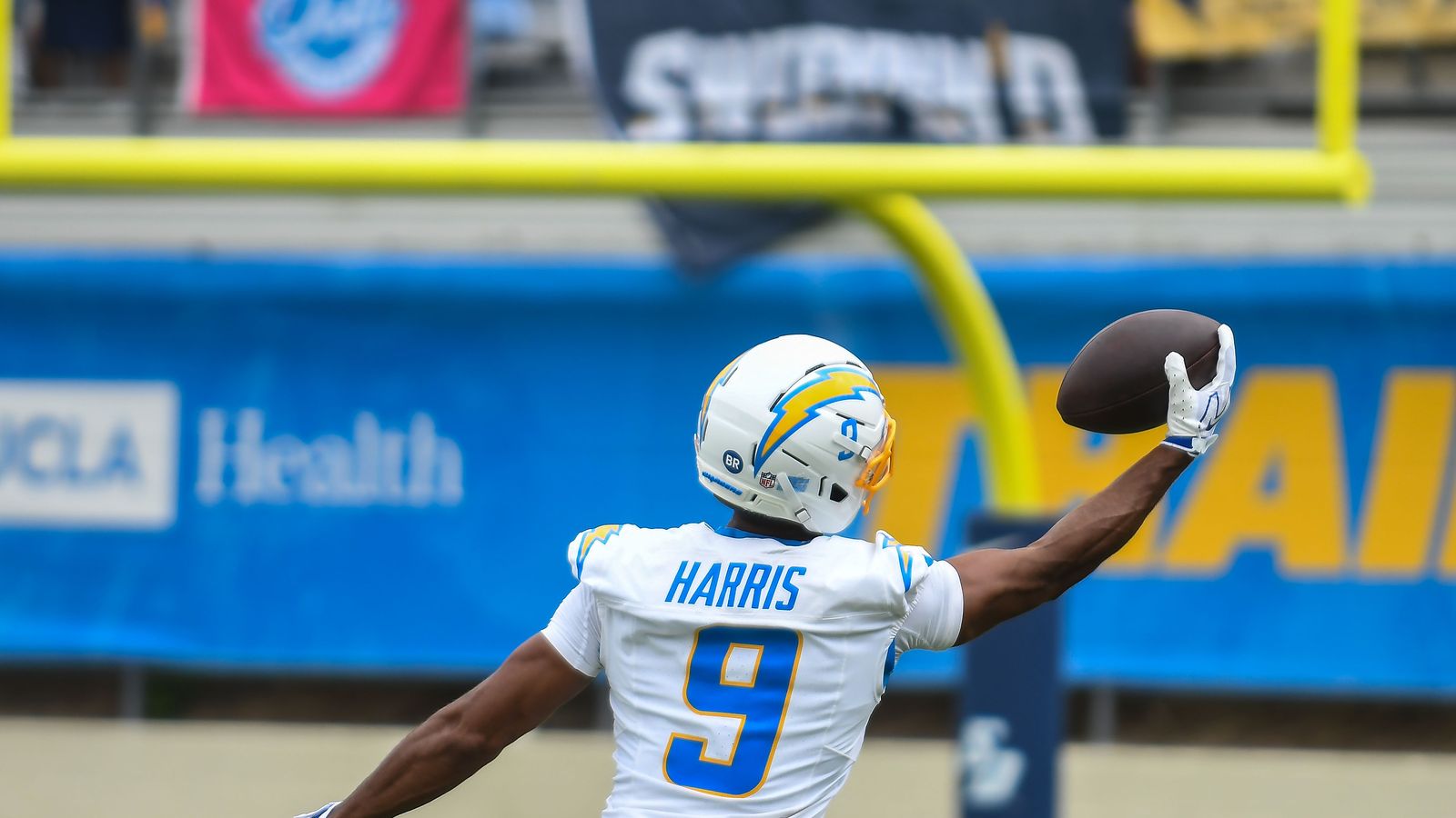 Tre Harris (9) catches a pass at Chargers training camp, San Diego