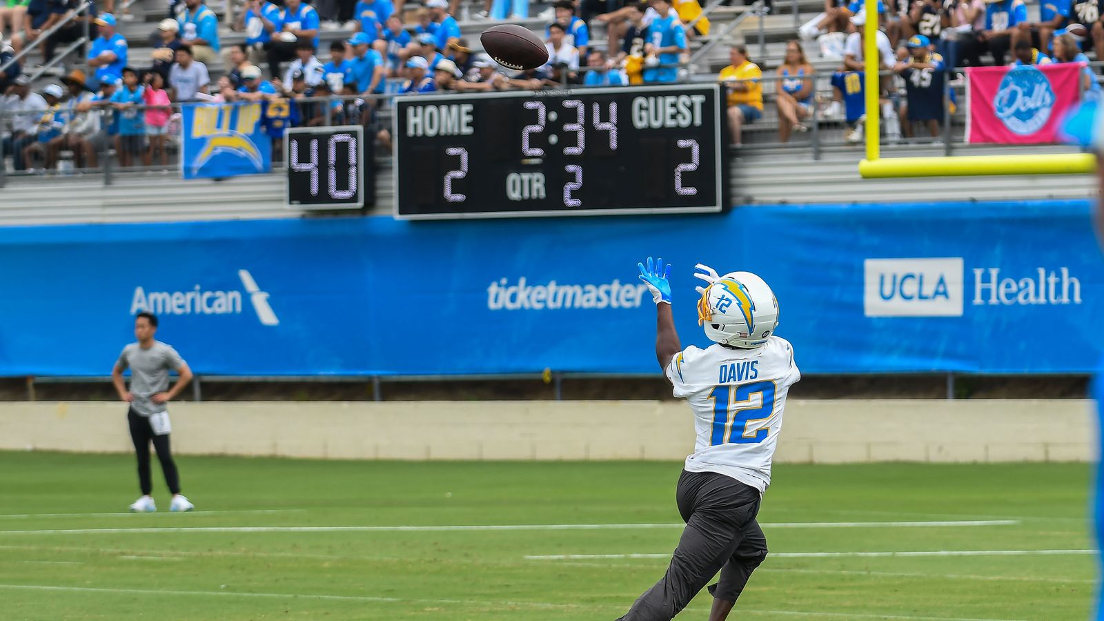 Derius Davis (12) catches a pass during Chargers training camp
