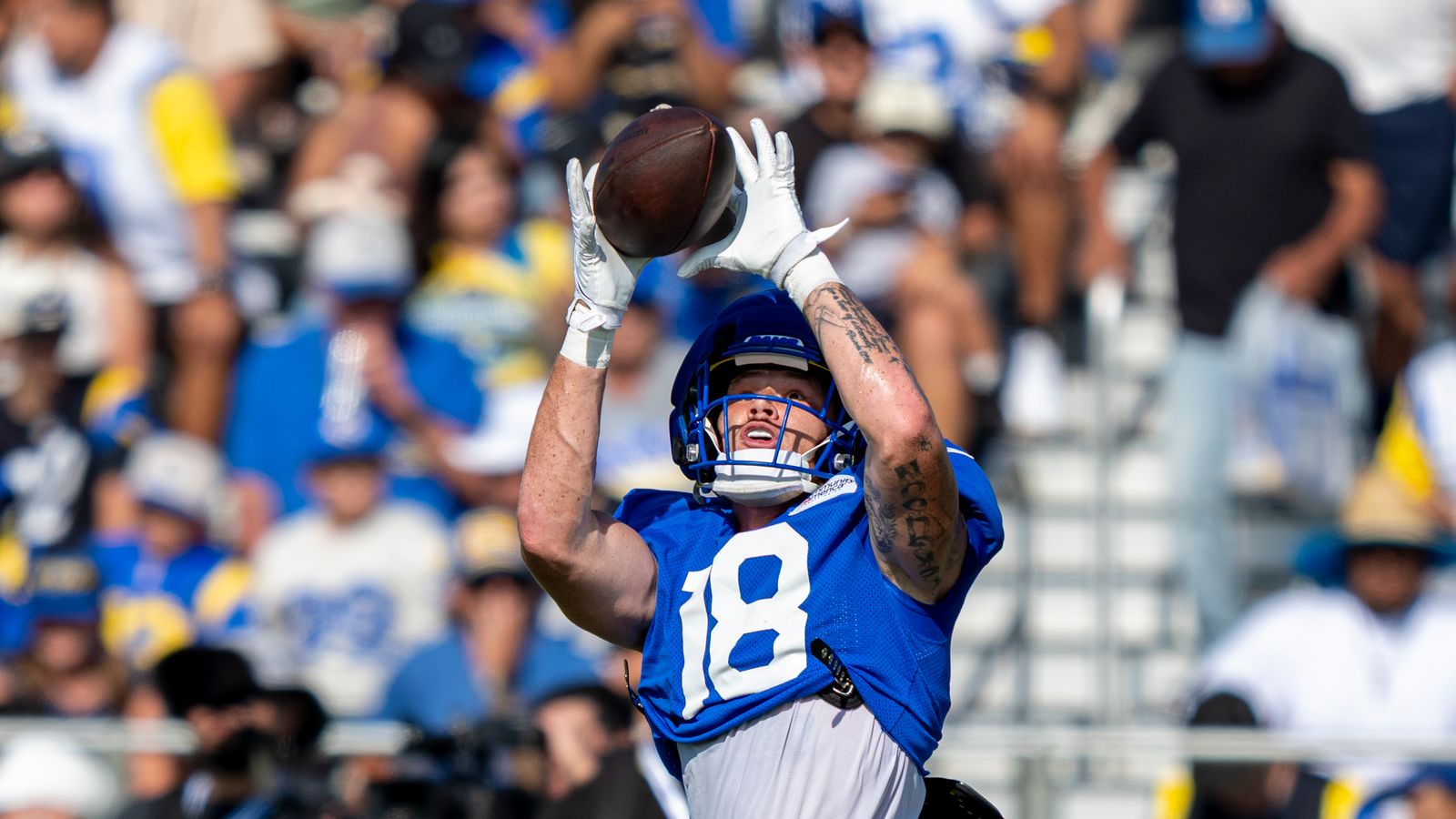 Terrance Ferguson #18 catches a pass at Rams training camp