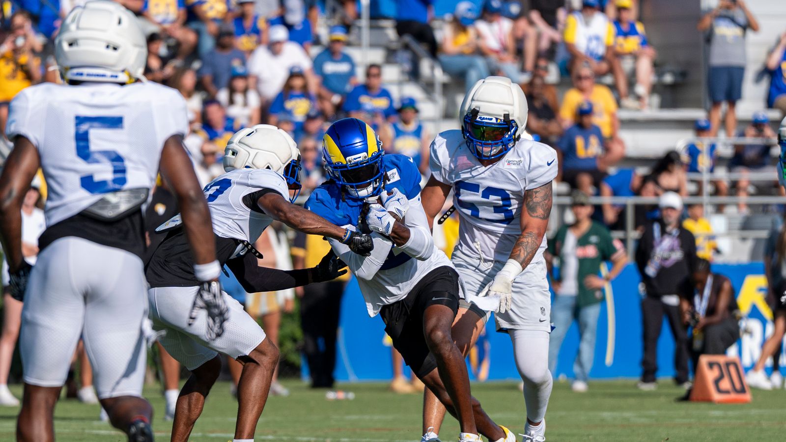 Davante Adams #17 runs after a catch at Rams training camp