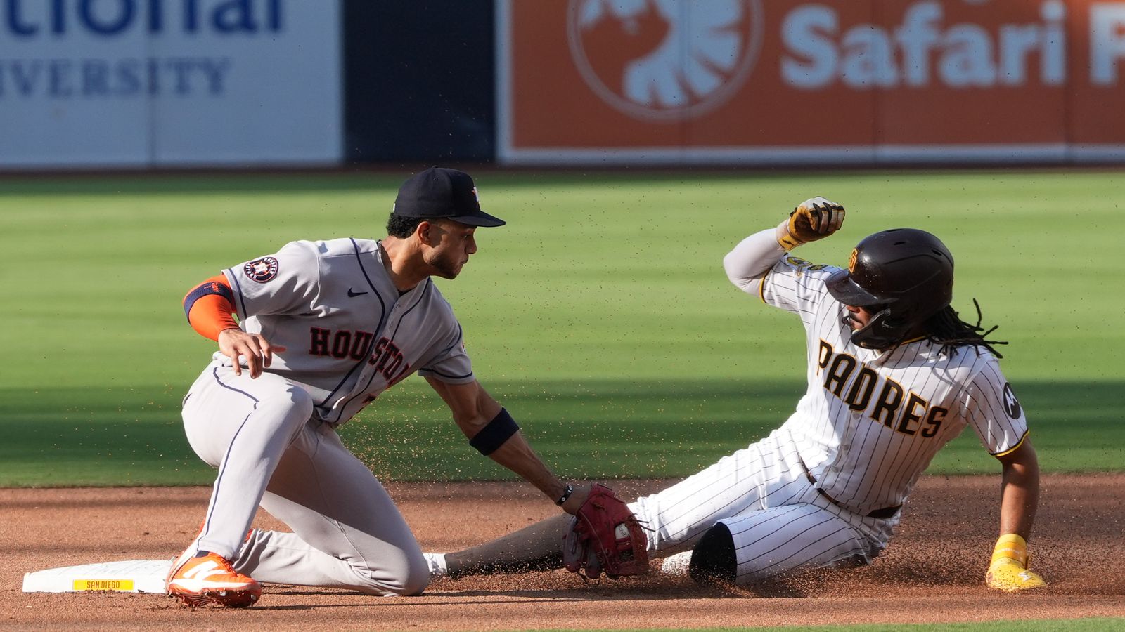Fernando Tatis Jr. slides into second base at Petco Park