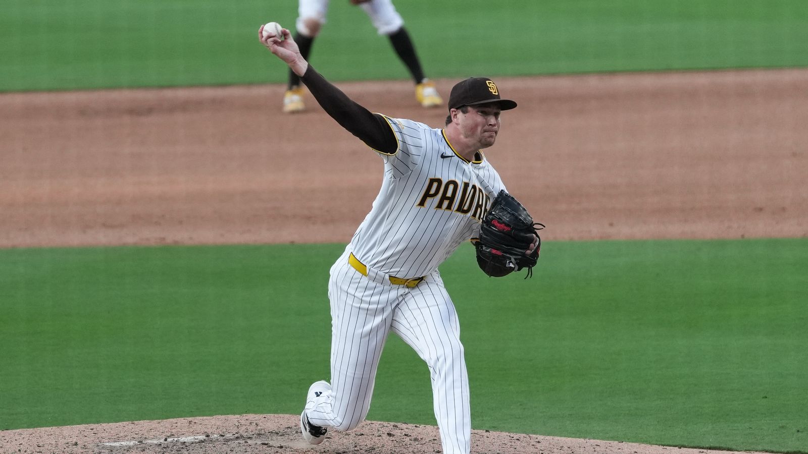 Mason Miller pitches in a tight game against Astros
