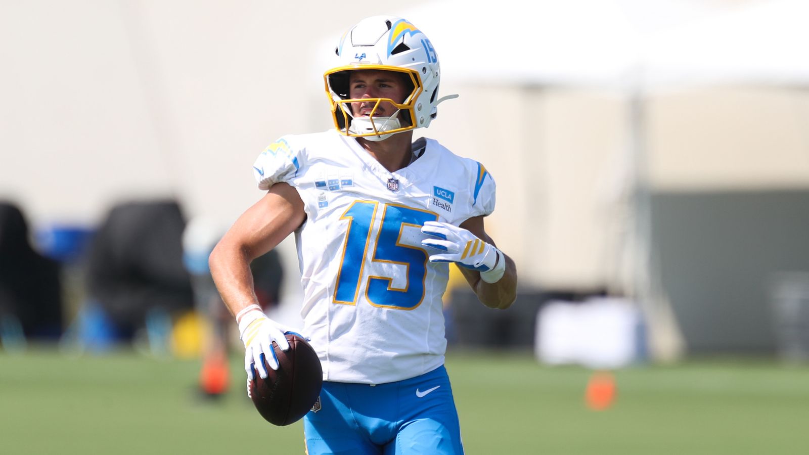 Ladd McConkey #15 observes teammates at Chargers Training Camp