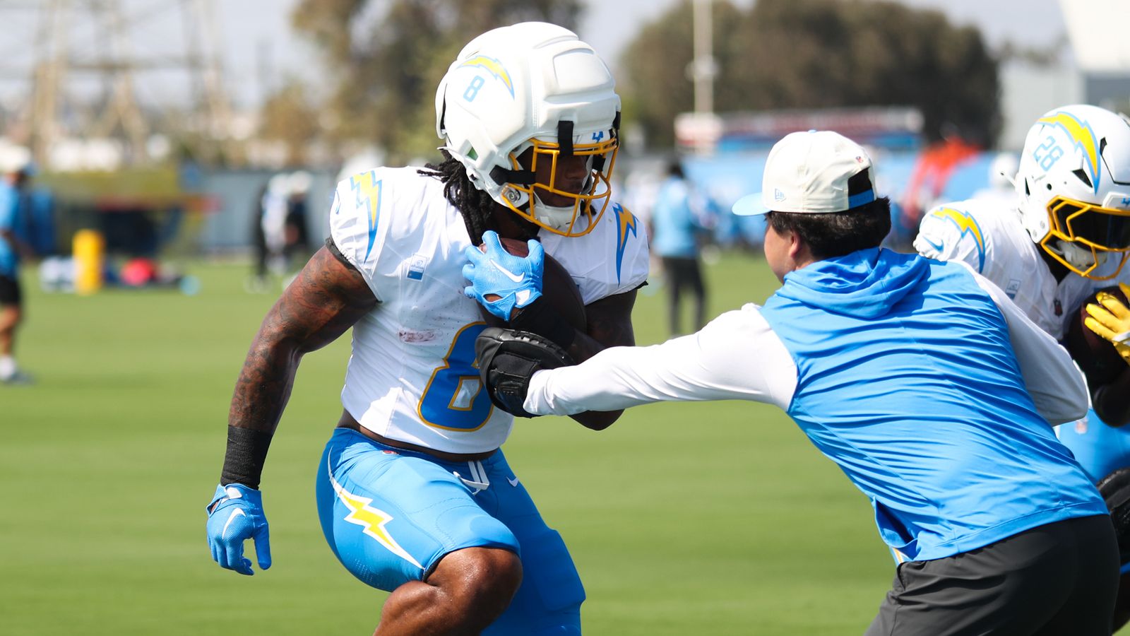 Omarion Hampton #8 participates in drills at Chargers Camp