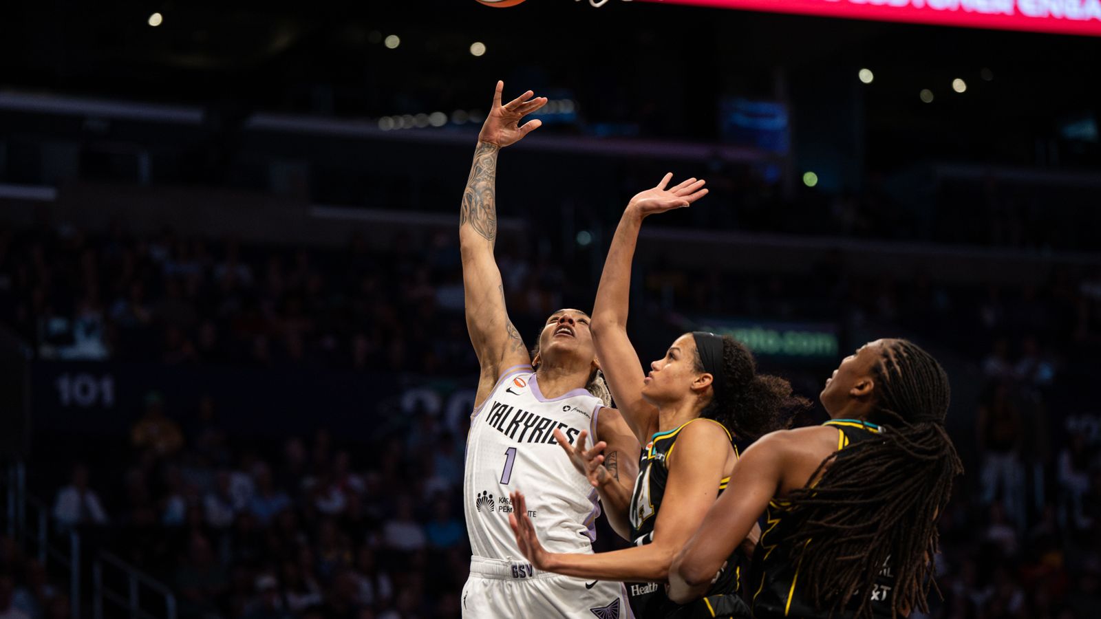 Gabby Williams shooting during a critical WNBA game phase.