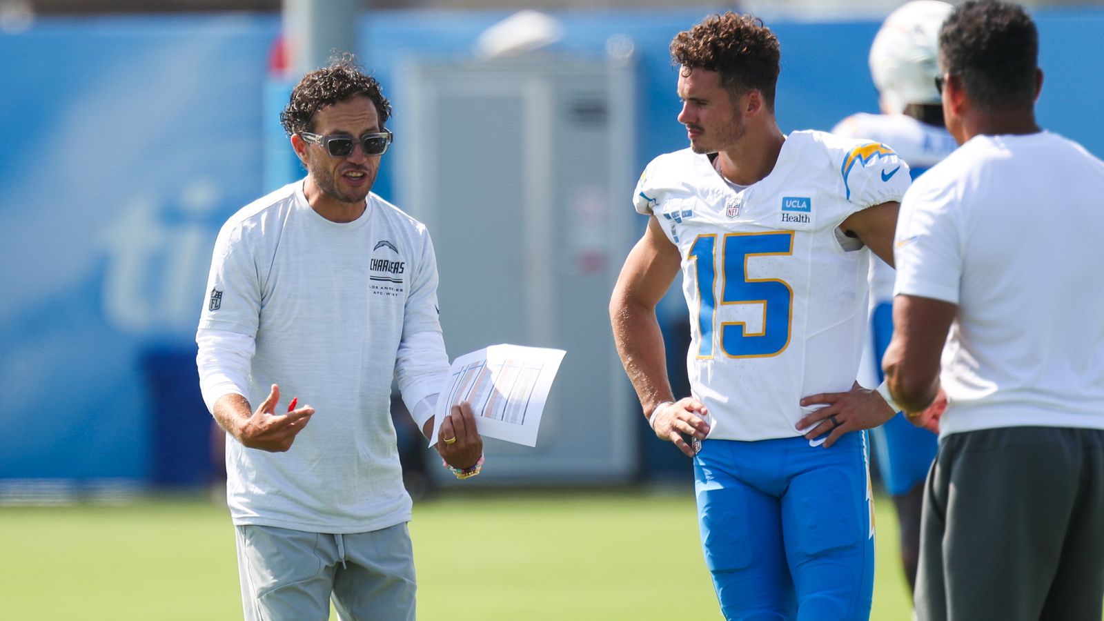 Mike McDaniel and Ladd McConkey strategize at Chargers Camp