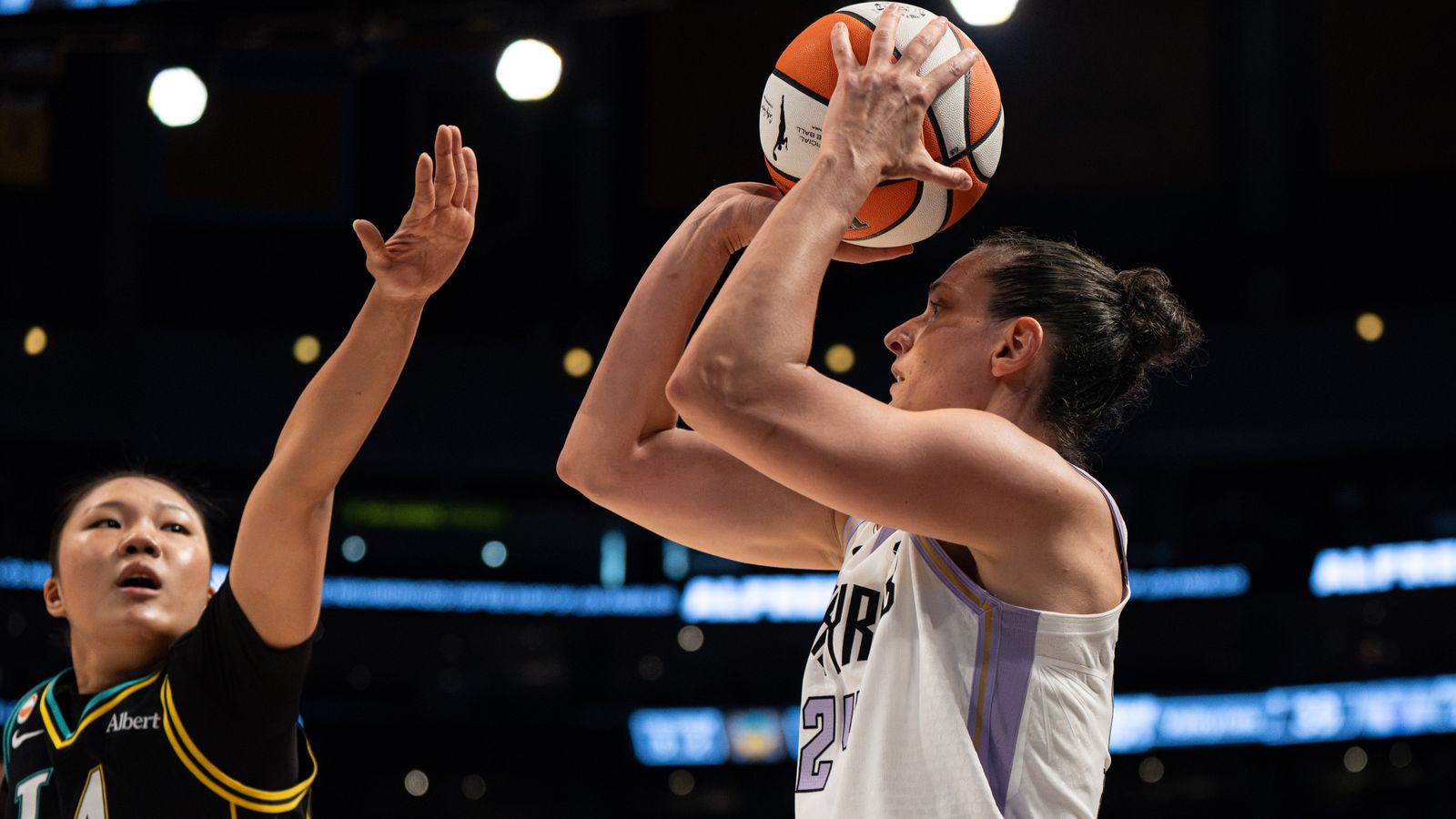 Cecilia Zandalasini shoots a three-pointer in WNBA game.