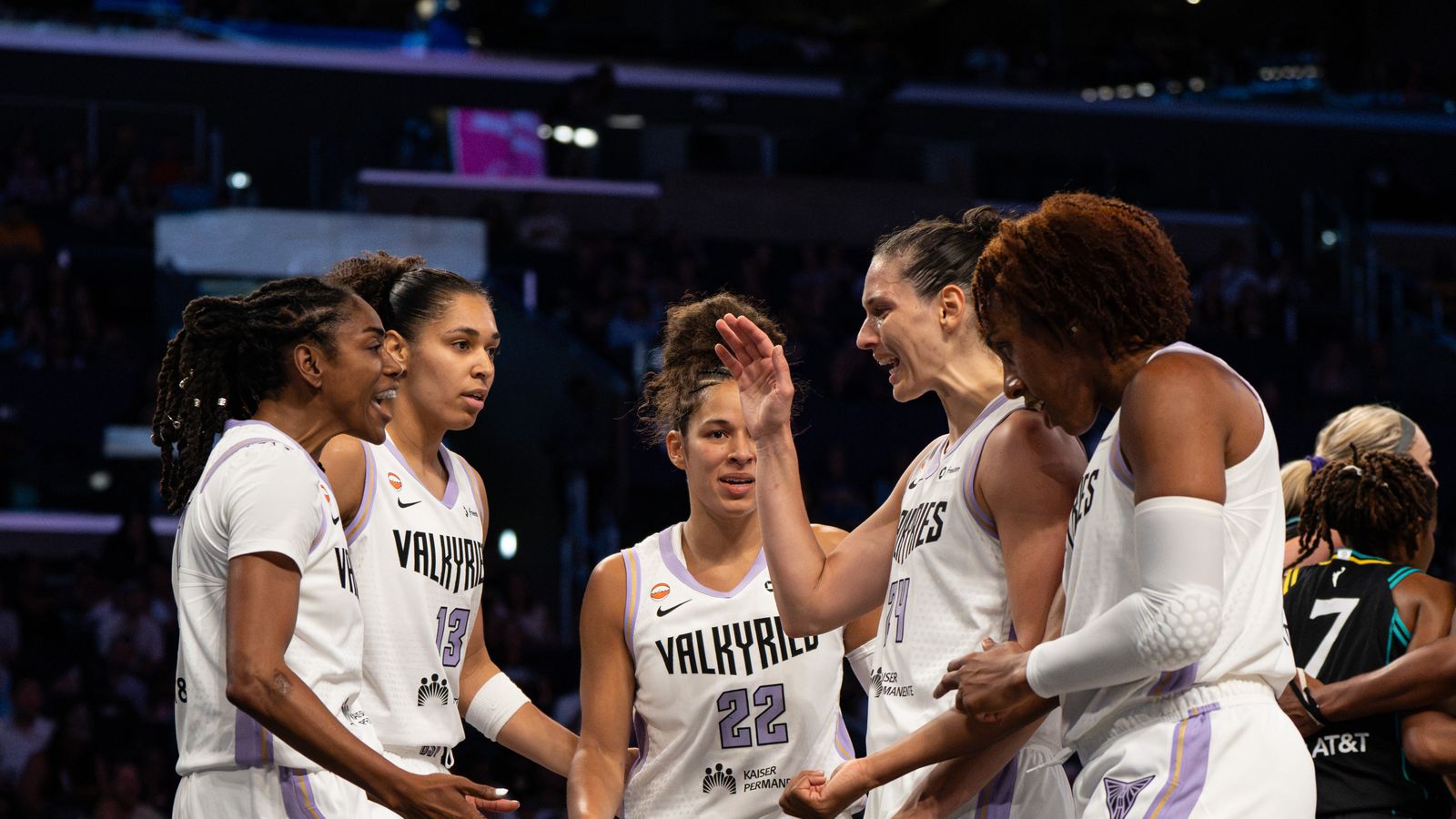 Cecilia Zandalasini celebrates with teammates in WNBA game.