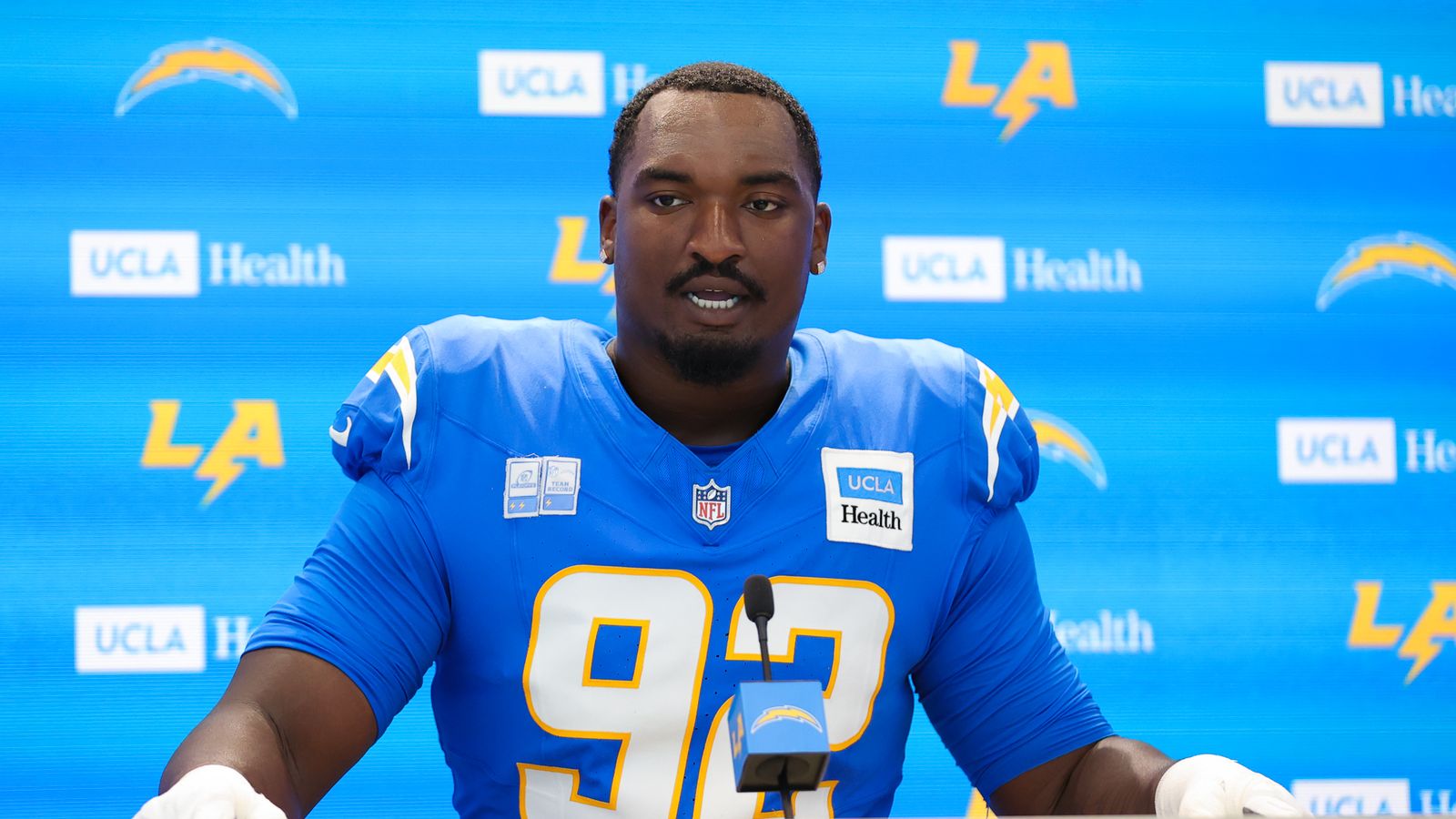 Justin Eboigbe #92 speaks to media at Chargers Training Camp