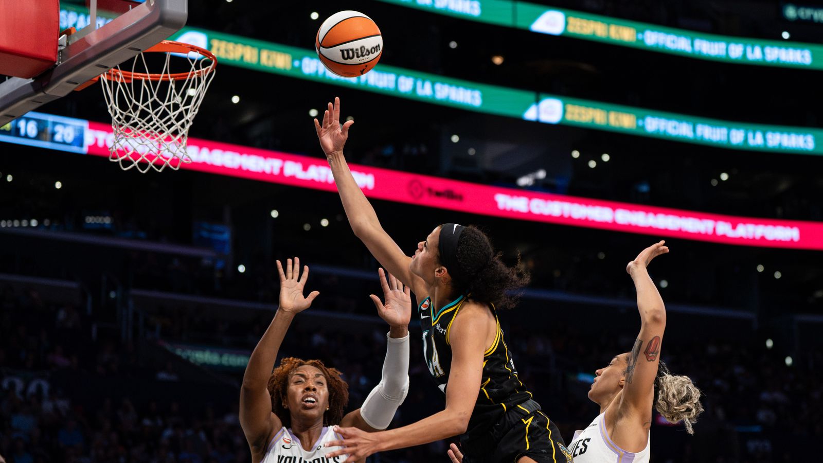 Iliana Rupert competes in WNBA game, Sparks vs Valkyries.
