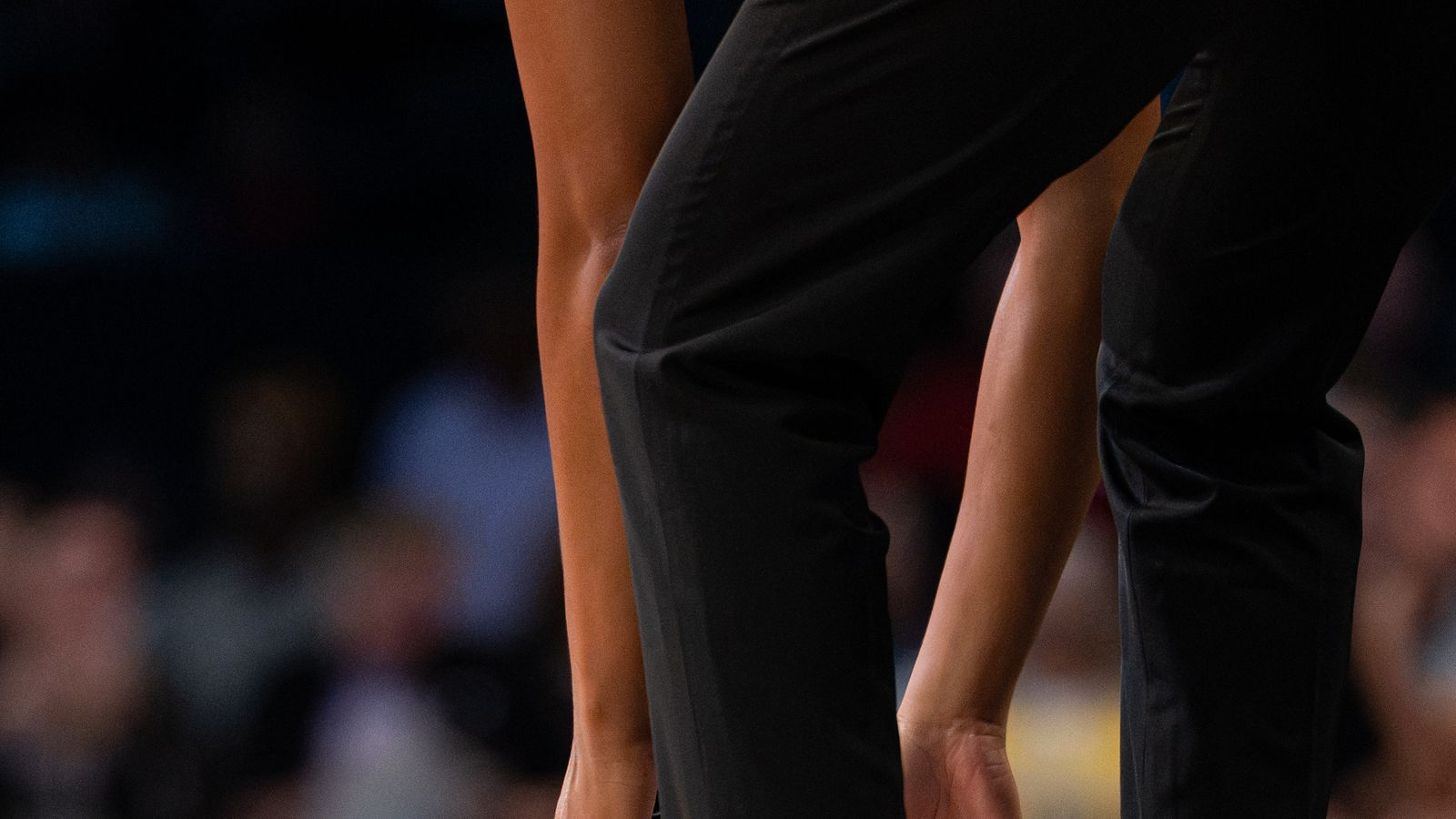 NBA referee at a WNBA game between Valkyries and Sparks.