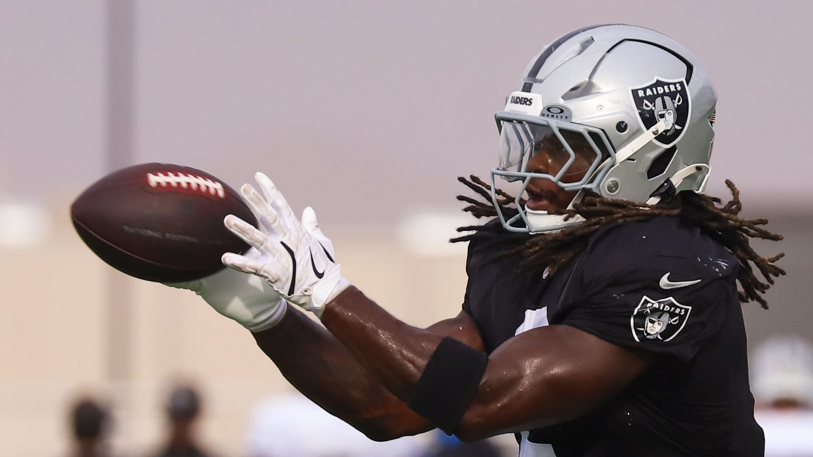 RB Ashton Jeanty catches the ball at Raiders Training Camp