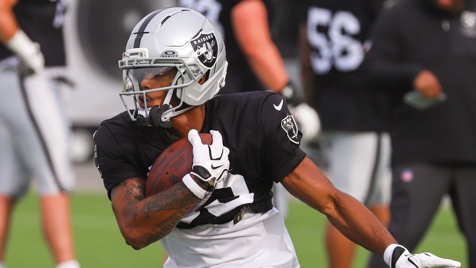 WR Deven Thompkins carries the ball at Raiders Training Camp