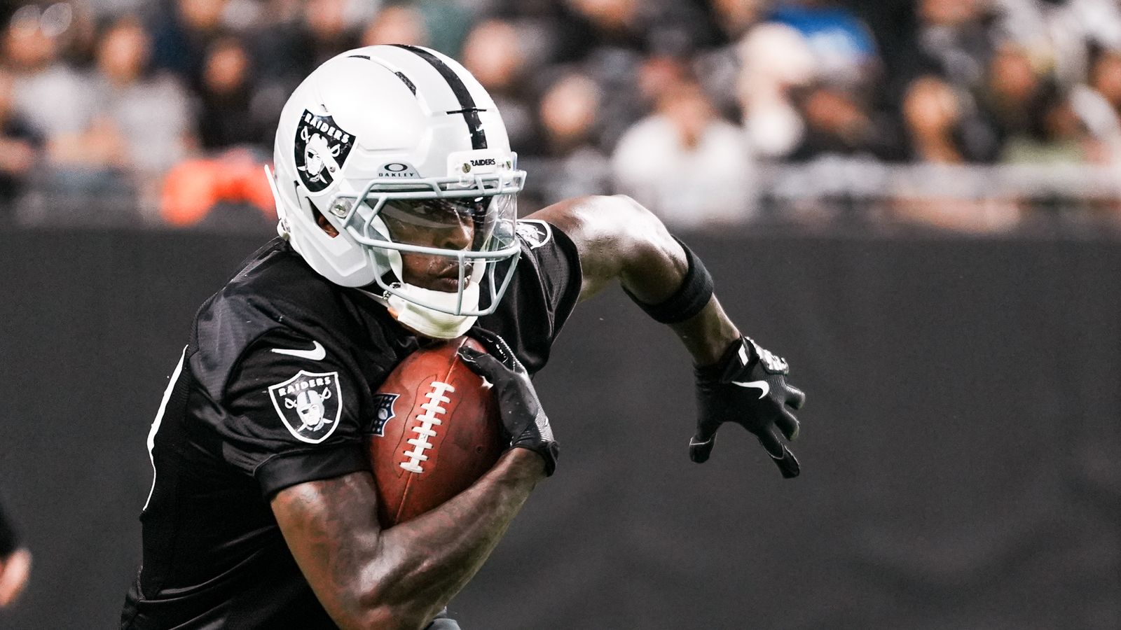 Malik Benson (19) scans the field during Raiders practice at Allegiant Stadium