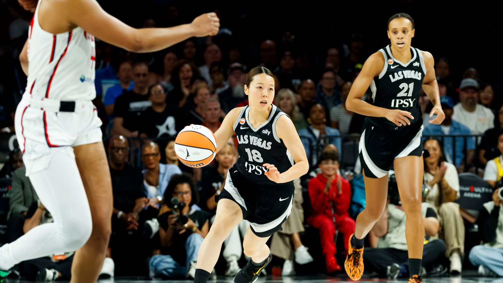Mai Yamamoto steals the ball in WNBA game against the Mystics