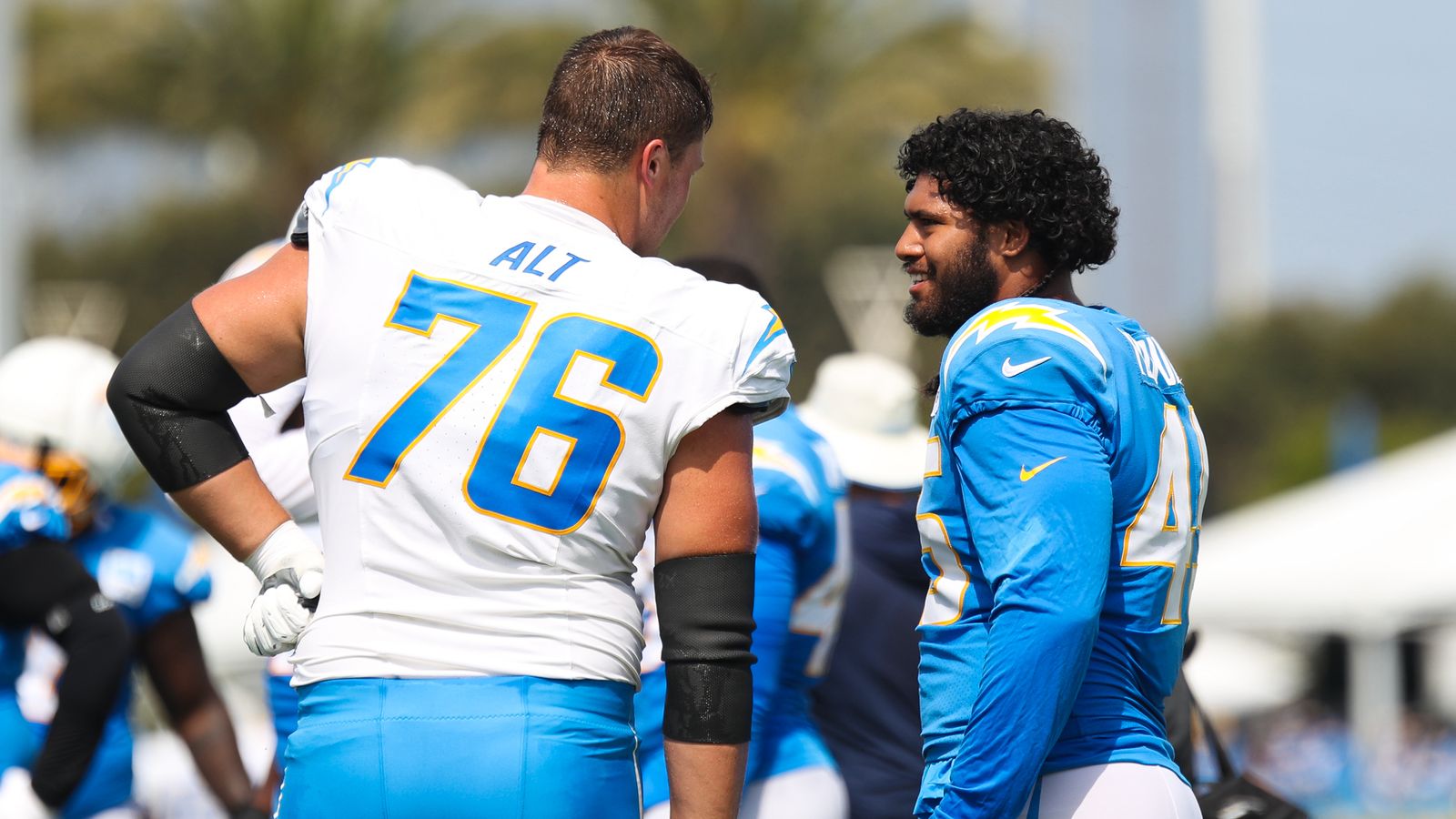 Joe Alt and Tuli Tuipulou Chat During a Break