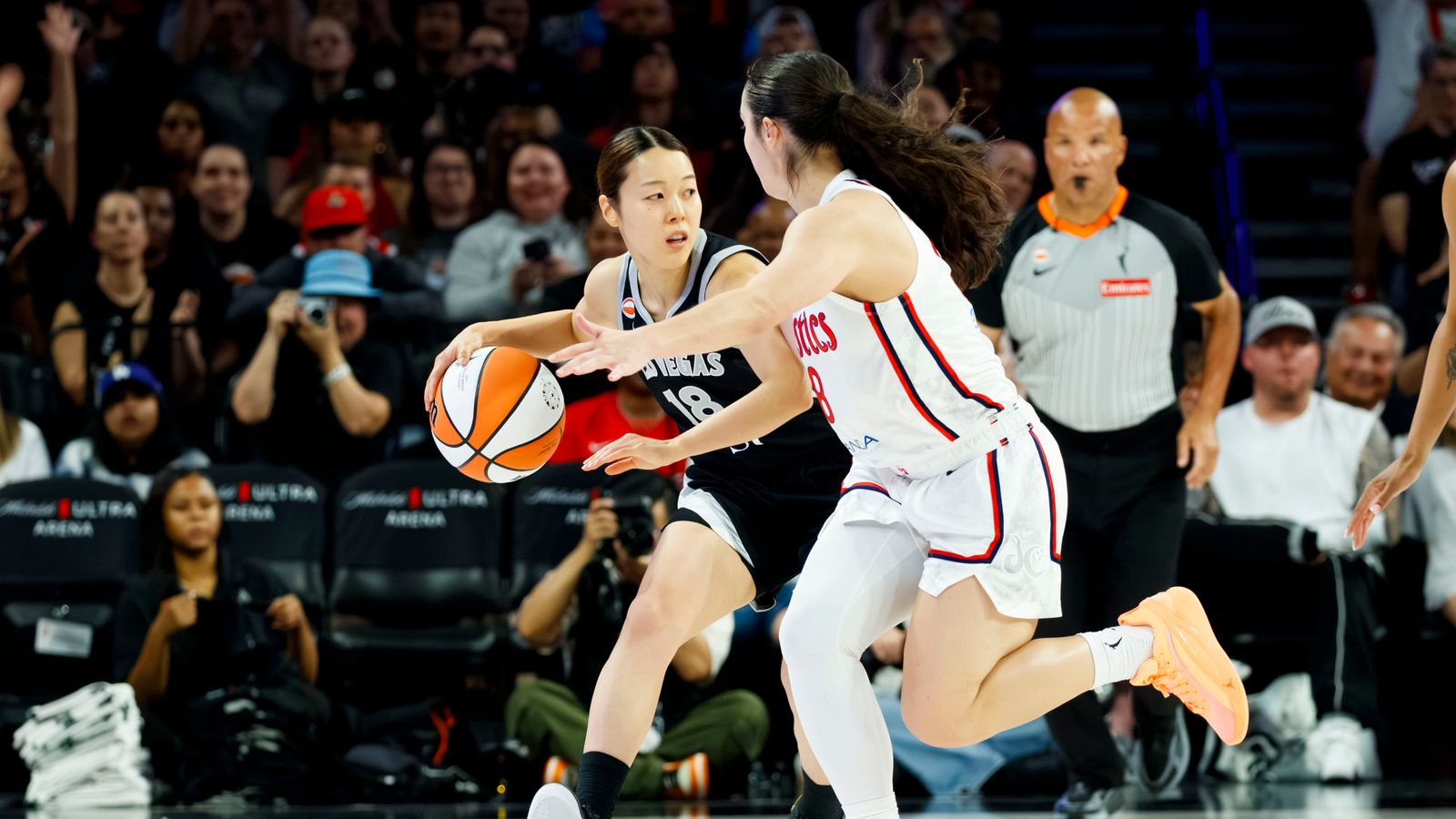 Mai Yamamoto steals the ball in WNBA game against the Mystics