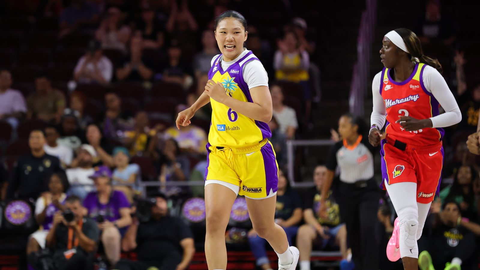 Jihyun Park celebrates a three-pointer for the Sparks