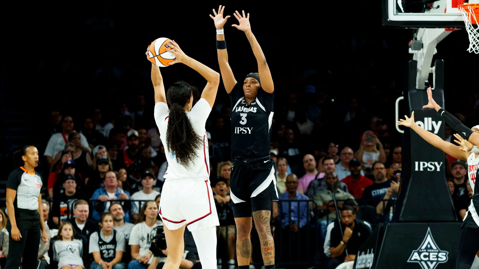 NaLyssa Smith blocks a shot in WNBA game against the Mystics