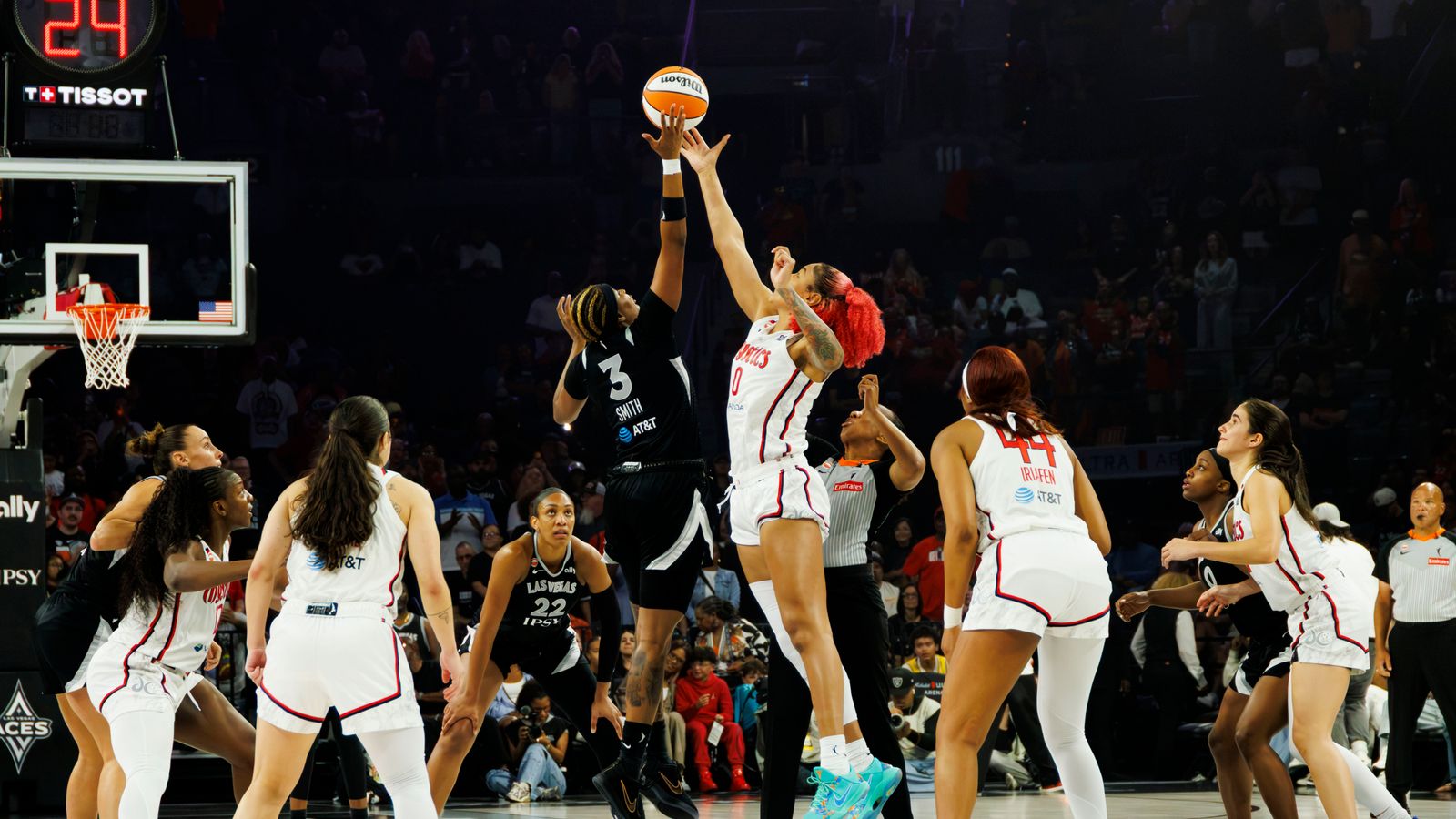NaLyssa Smith wins the tip-off in WNBA game against the Mystics