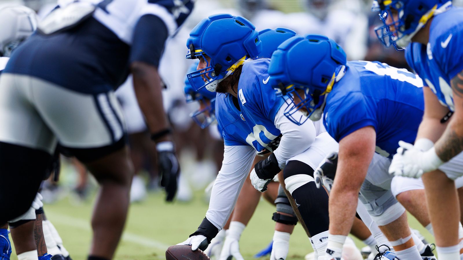 Rams offensive line in action during joint practice with Cowboys