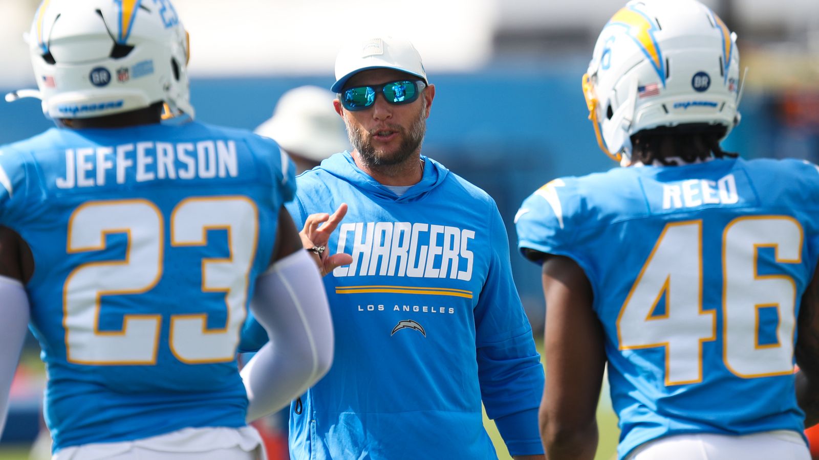 Coach Nick Hardwick Discusses Tactics with Players