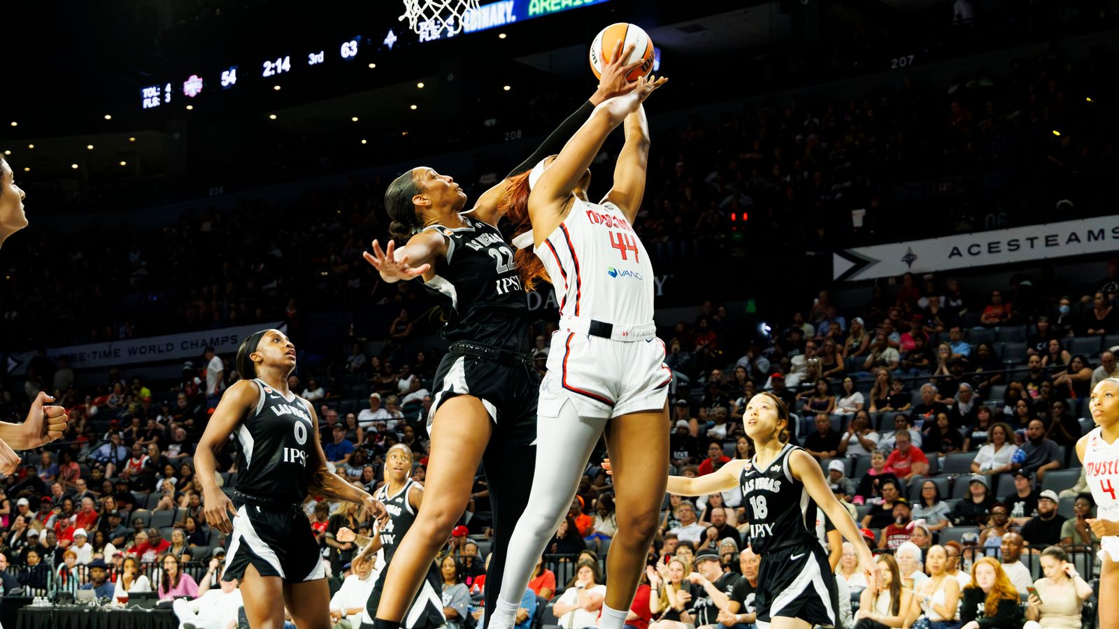 A’ja Wilson blocks a shot in WNBA game against the Mystics