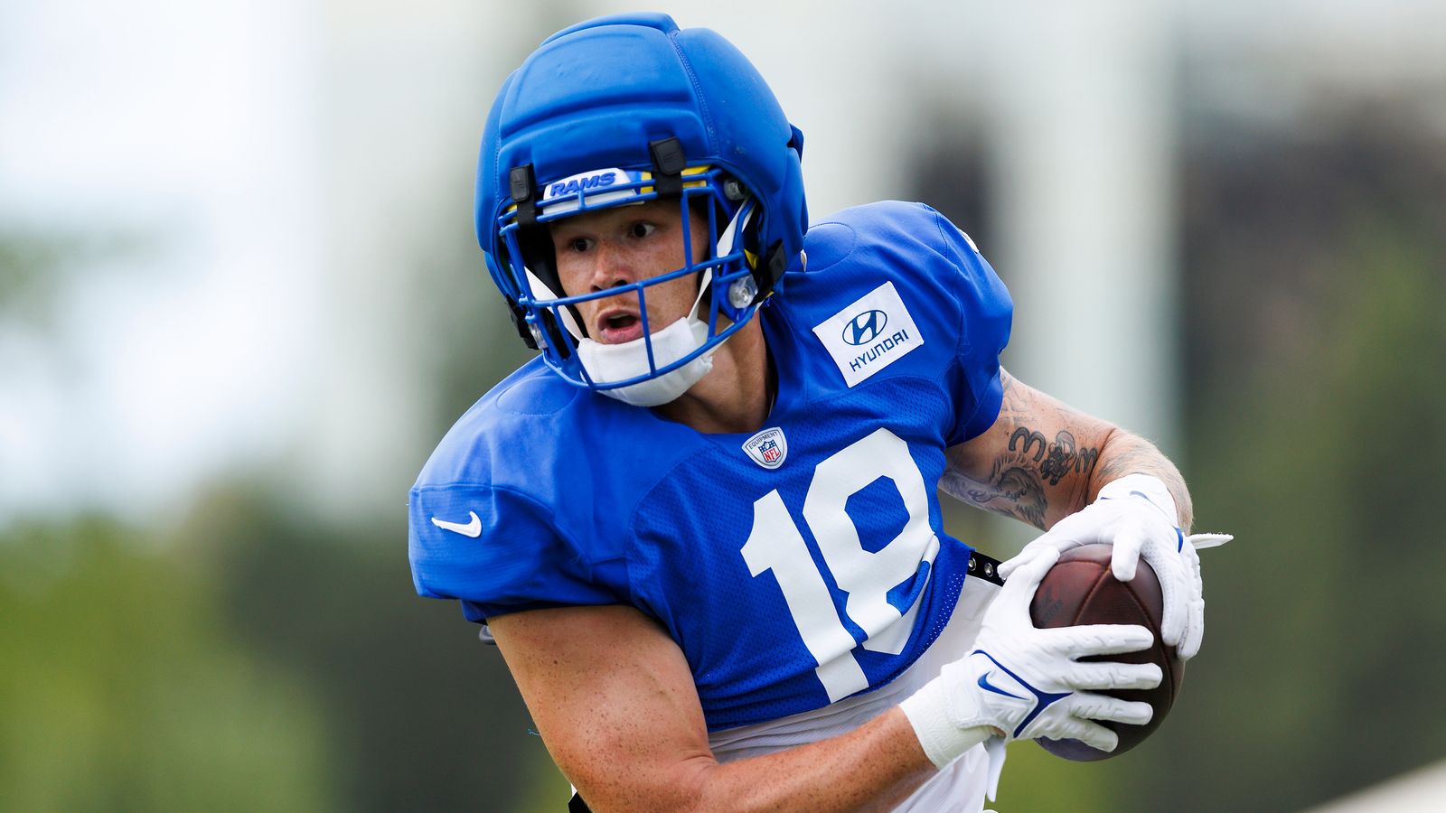Terrance Ferguson runs after catch at Cowboys-Rams joint practice
