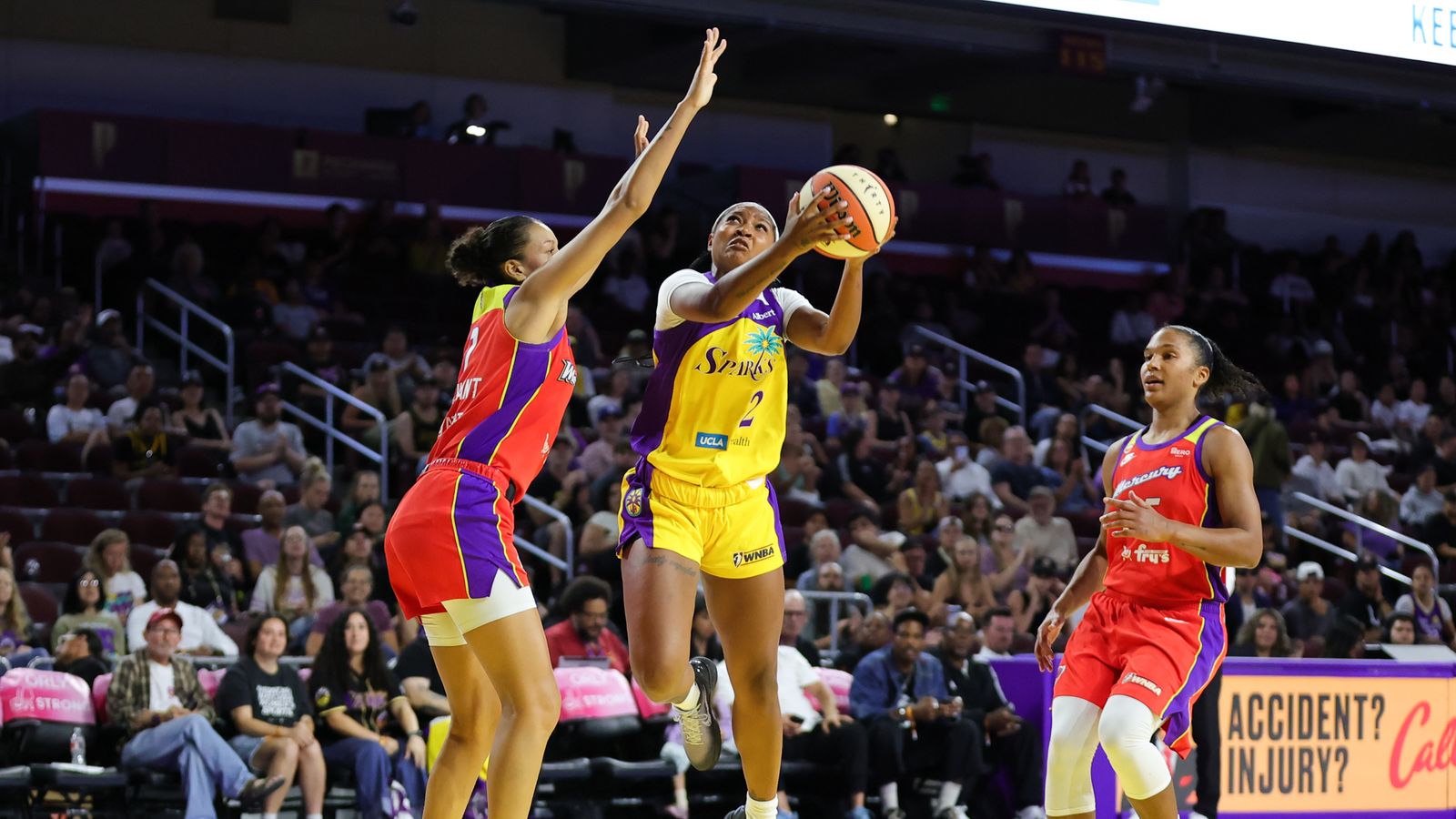 Chance Gray drives for a lay up in WNBA game