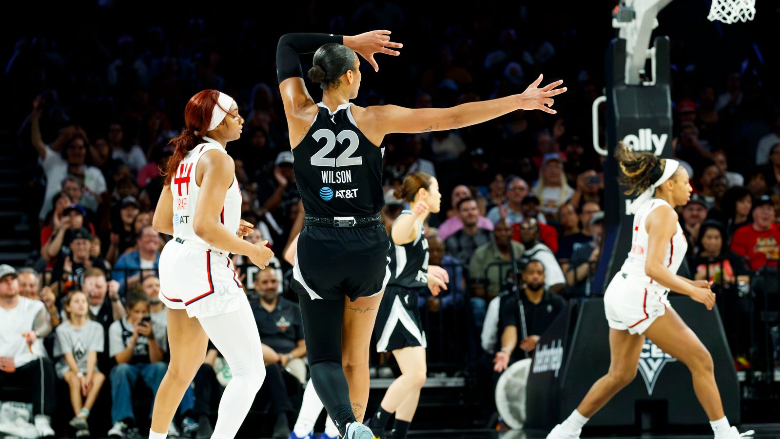 A’ja Wilson celebrates a three-pointer in WNBA game against the Mystics