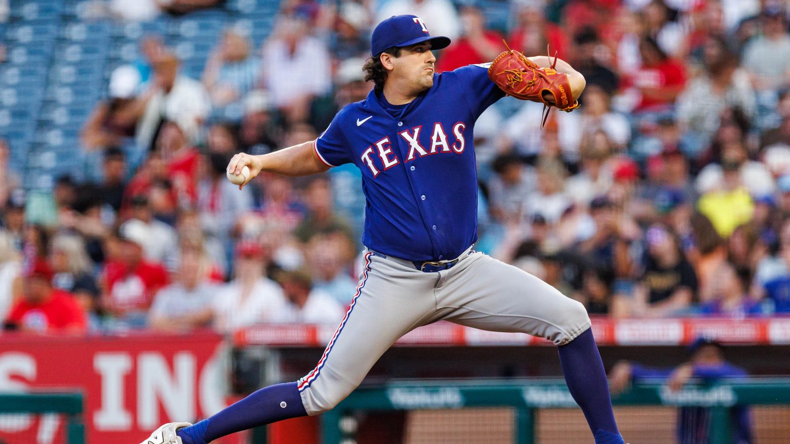 Cal Quantrill of Rangers pitching in game versus Angels