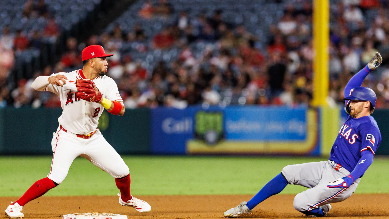 Oswald Peraza attempts a double play against Rangers