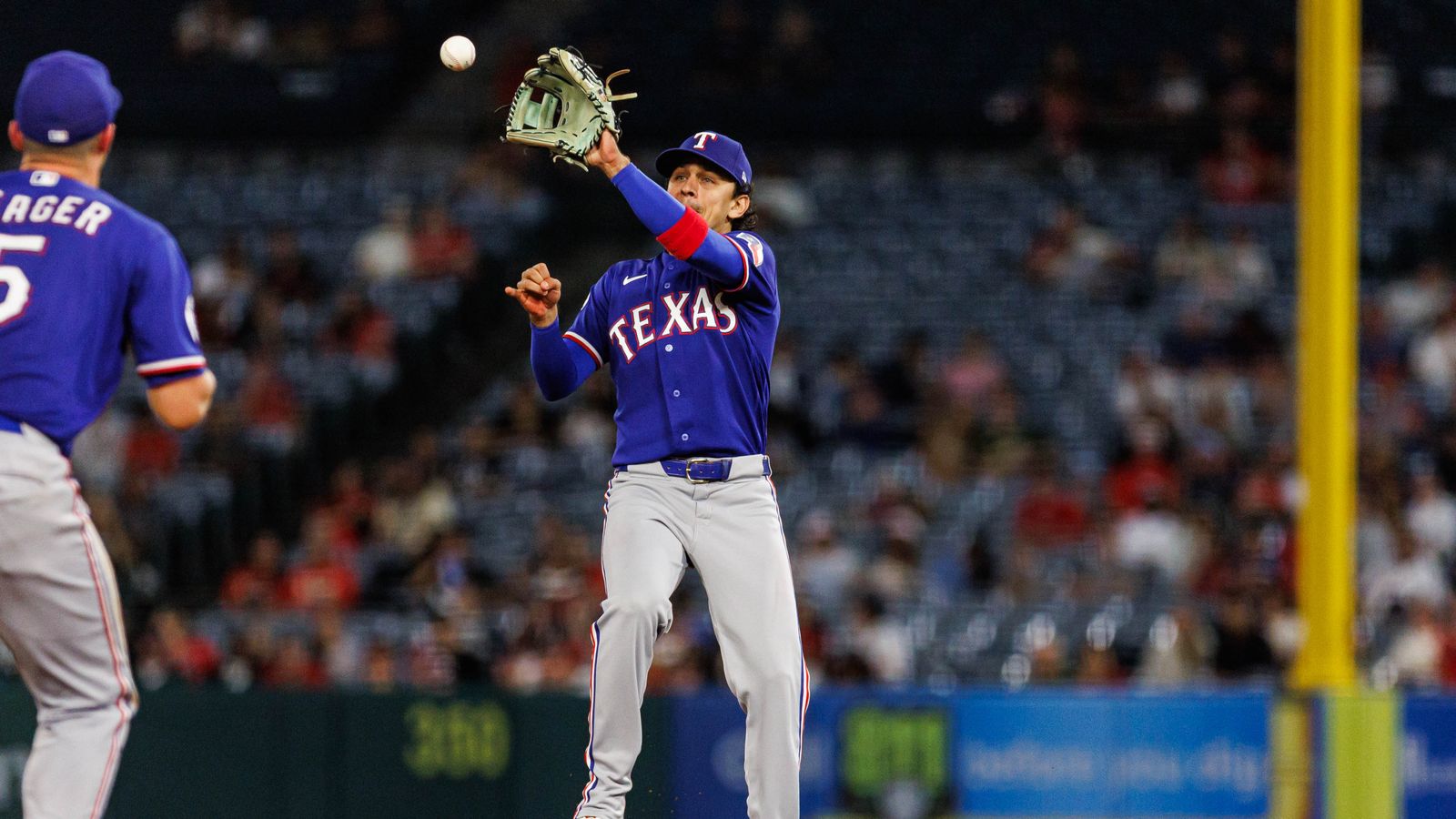 Nicky Lopez tries for a double play against the Angels