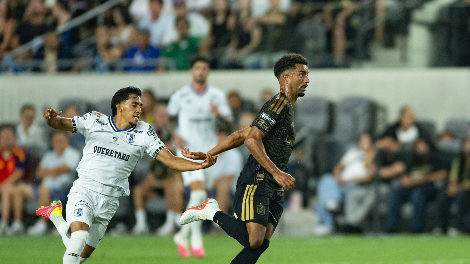 Timothy Tillman drives forward with the ball for LAFC