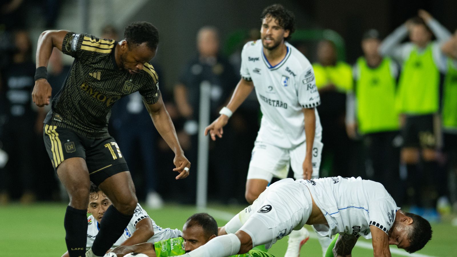 Goalkeeper Guillermo Allison secures the ball for Queretaro