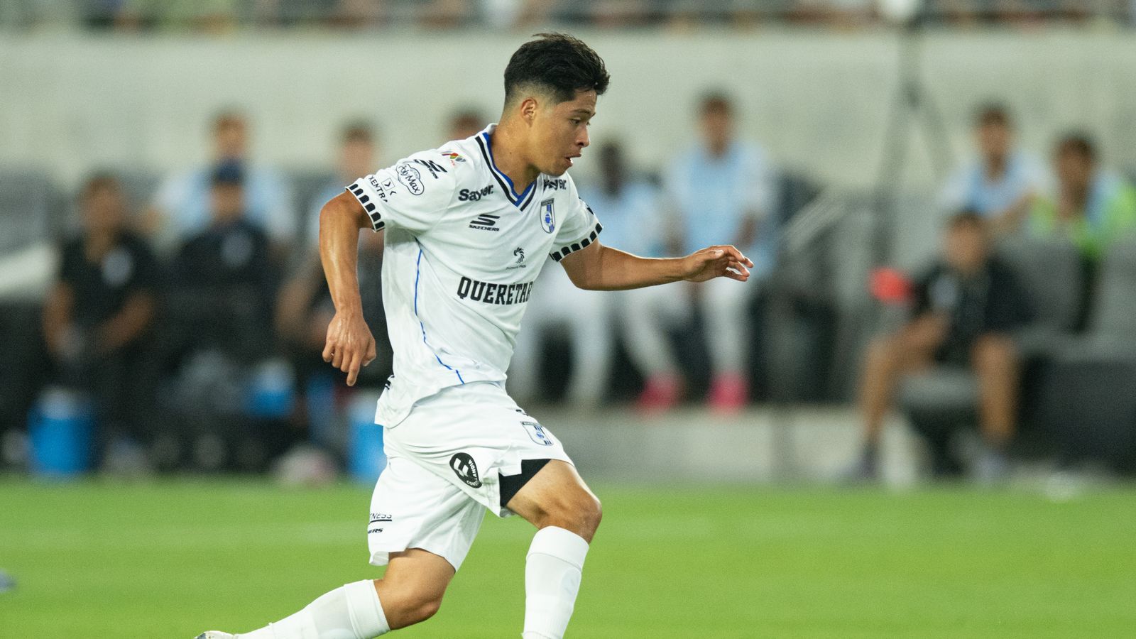 Alejandro Alcala leads an attack for Queretaro